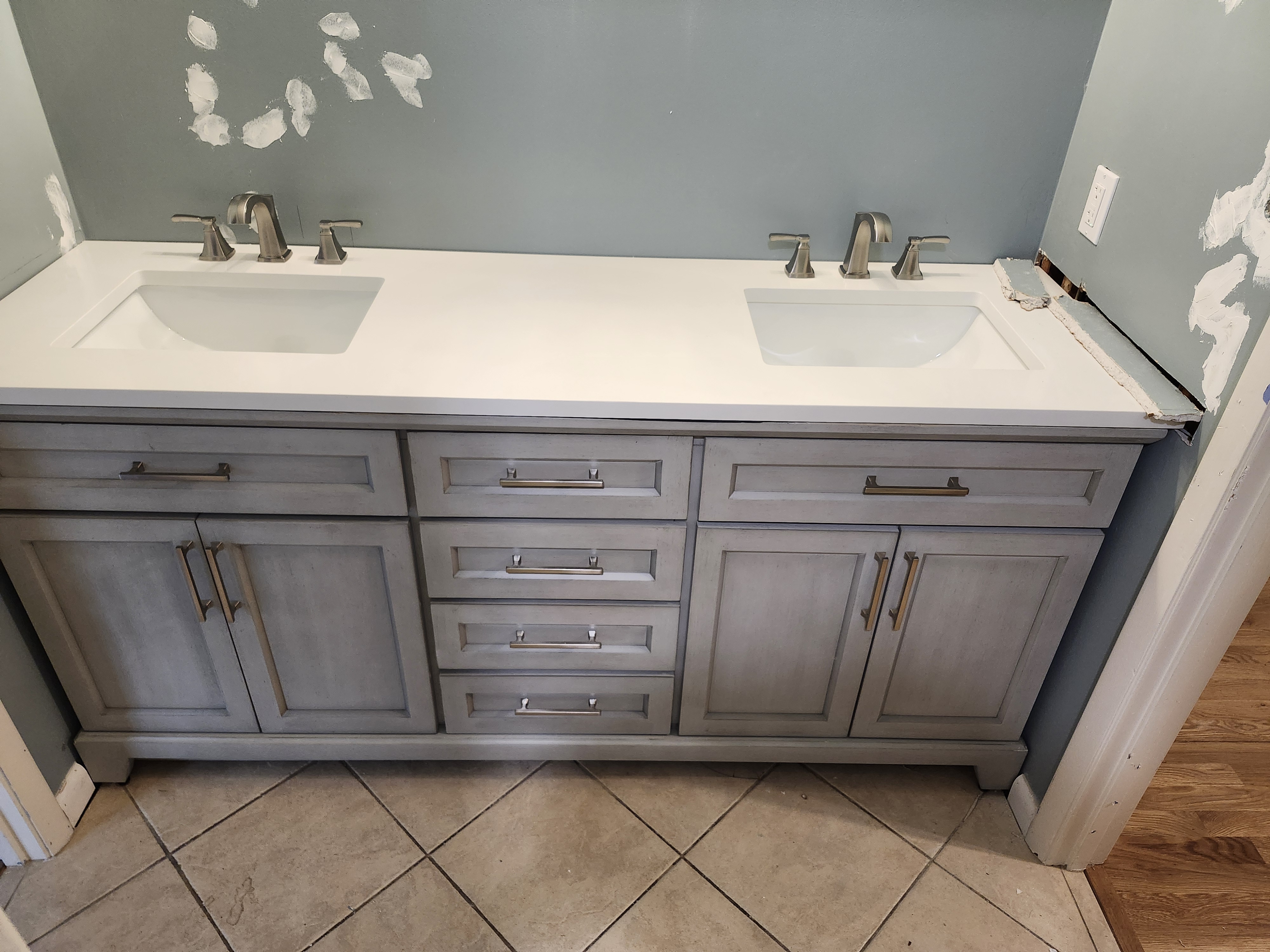 Finished double-sink bathroom vanity remodel